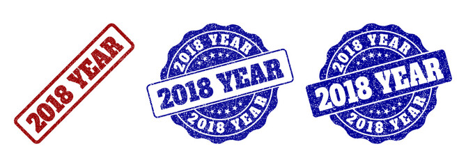 Fototapeta premium 2018 YEAR scratched stamp seals in red and blue colors. Vector 2018 YEAR labels with draft surface. Graphic elements are rounded rectangles, rosettes, circles and text labels.