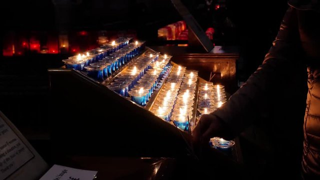 Lot of candles in the he Basilica of the Sacred Heart of Paris