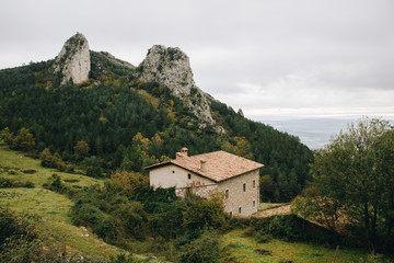 Fototapeta na wymiar Old house in the mountains in Alps