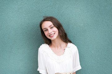 Pretty young girl with charming smile