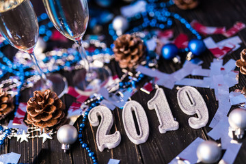 New year 2019 composition with champagne and christmas decoration background