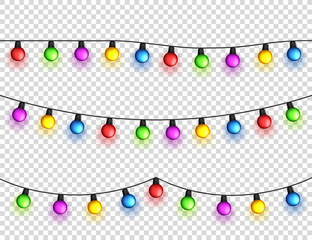 Christmas glowing lights. Garlands with colored bulbs. Xmas holidays. Christmas greeting card design element. New year,winter.