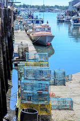 Fototapeta na wymiar Lobster traps and boats