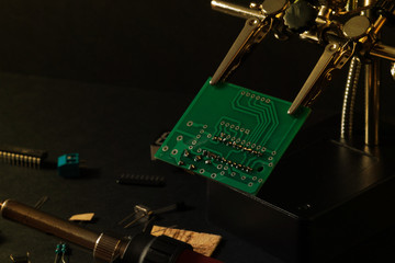 Modern technologies. The components of the main board in the process of assembling the finished...