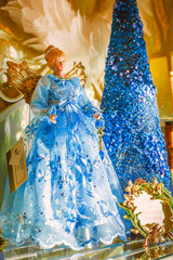 Christmas Angel Doll wearing a blue dress