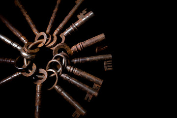 Bunch of Vintage Antique Risty Keys on Black Background