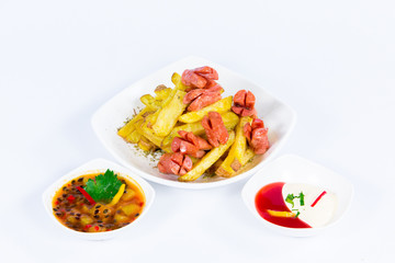 South American cuisine. Salchi Papa: French fries with sausage