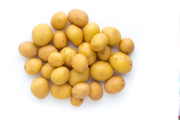 Young potato isolated on white background. Harvest new. Flat lay, top view