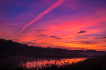 Swamp/lake bathing in the dramatic morning sunrise colors