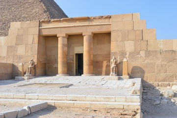 Remains of Ancient temple in Egypt with Pharaohs guiding the site