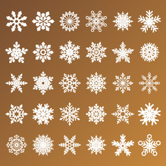 collection of golden vector snowflakes on white background