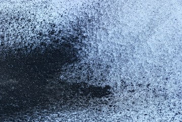 black white natural background of snow and ash