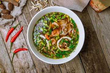 Vietnamese soup Pho with shrimp and squid