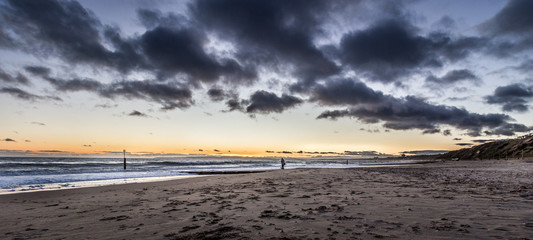 Panoramic beach landscape with dramatic sky