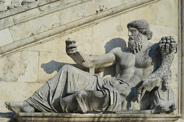 Palazzo Senatorio, in Piazza del Campidoglio de Roma or Capitoline square, Rome, Lazio, Italy - July 2, 2015: statue of Nile River god, part of an ensemble formed of two ancient statues of river gods