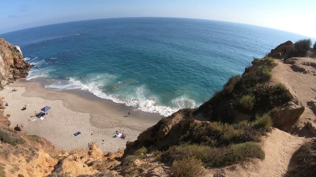 Aerial view of Pirates Cove, a hidden sandy beach in a small cove on west side of Point Dume, Malibu coast in CA, United States. California West Coast. Blue sky, summer season, sunny day. Copy space.