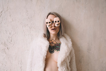 young woman with halloween sunglasses