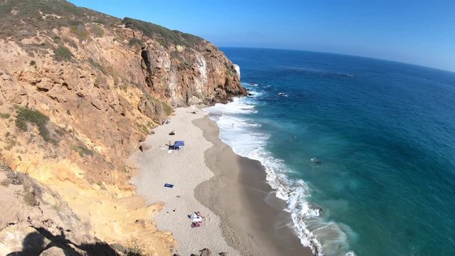 California West Coast. Panoramic view of Pirates Cove beach, a small cove on west side of Point Dume, Malibu coast, United States. Blue sky, summer season, sunny day. Pacific coast in CA. Copy space.