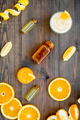 citrus orange cosmetic for natural spa bath on rustic table background top view pattern