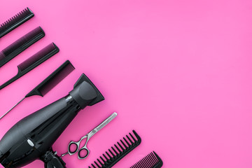 combs for hairdresser hairdresser on pink background top view mock-up