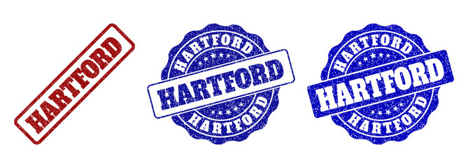 HARTFORD grunge stamp seals in red and blue colors. Vector HARTFORD labels with scratced surface. Graphic elements are rounded rectangles, rosettes, circles and text labels.