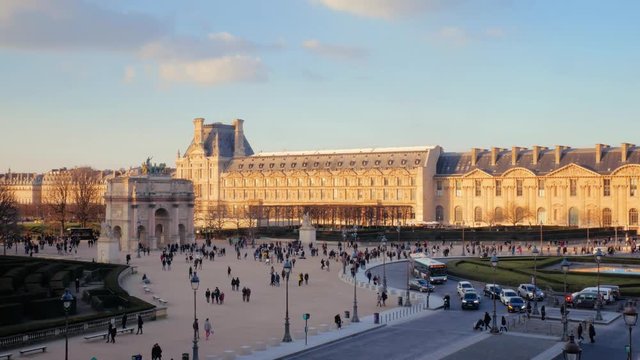 famous paris museum louvre pyramids square, france in sunset