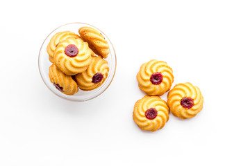 Homemade cookies. Kurabe in glass bowl on white background top view