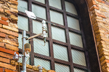 Anemometer on ancient wall