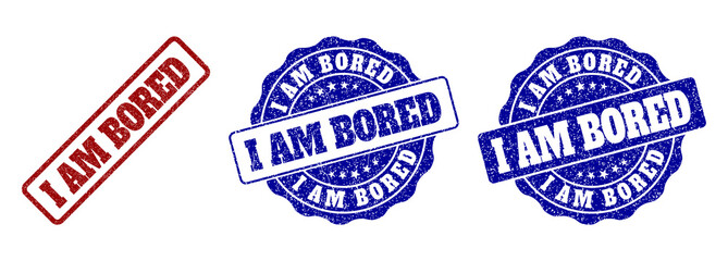 I AM BORED grunge stamp seals in red and blue colors. Vector I AM BORED imprints with grunge effect. Graphic elements are rounded rectangles, rosettes, circles and text titles.