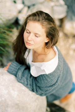 young woman with closed eyes
