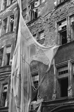 Plastic sheet on ruined building
