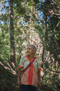 Senior Karen man walking in the forest