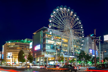street view of nagoya with ferris wheel in japan