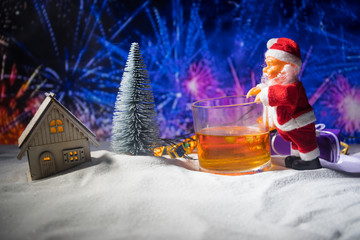 Plush Santa Claus with single malt whisky in glass, Symbol of Christmas holiday, Xmas set, decoration