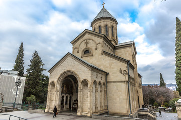 Fototapeta na wymiar Tbilisi, Georgia - Jan 7th 2018 - A orthodox church in Tbilisi, the capital of Georgia in a cloud day in the winter