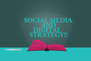 Handwriting text writing Social Media And Digital Strategy. Concept meaning Online marketing multimedia advertising Color Pages of Open Book photo on Table with Pen and Light Beam Glaring