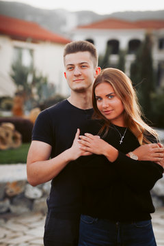 Portrait of beautiful young couple enjoying nature.Young beautiful couple outdoor.Young couple in love enjoying their honeymoon