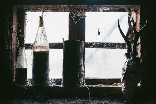 Scary face sculpture in spooky setting