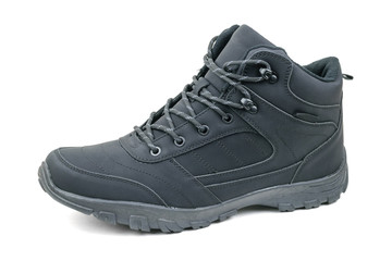 Insulated black men's shoes on the left leg isolated on a white background.