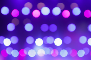 Light bokeh. Abstract blurred christmas background. Color circles in the lens blur zone.