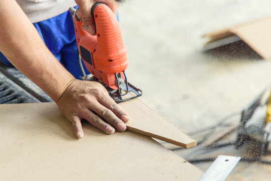 Worker Use Jigsaw Tool Saw Wood Plate