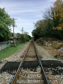 railroad tracks converging in the distance