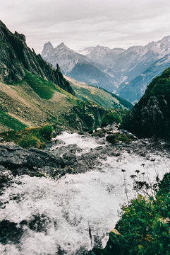 Wild Mountain River Running Through Alpine Landscape Shot on Por