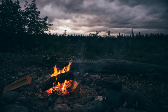 Campfire and Flames During Pretty Alaskan Sunset 