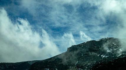  Snow-capped peaks, the game of clouds and fog. Breath stone and just living mountains near the volcano Orizaba