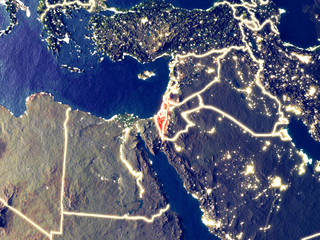Israel from space on Earth at night. Very fine detail of the plastic planet surface with bright city lights.