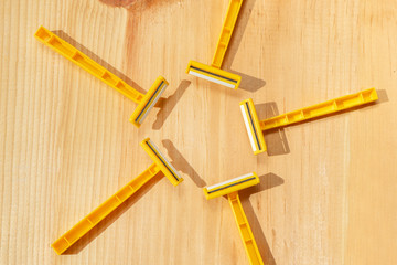 Yellow plastic razor