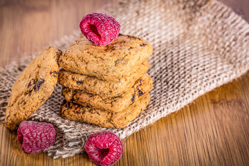 Oatmeal cookies with raspbarry and milk in a glass, healthy snac