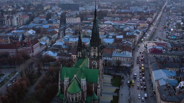 Aerial view of the historical center of Lviv near Church of Saints Olga and Elizabeth. Shooting with drone. Hyperlapse in evening