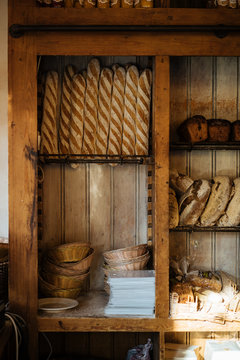 Bread store display shelves with fresh bread adn bagets